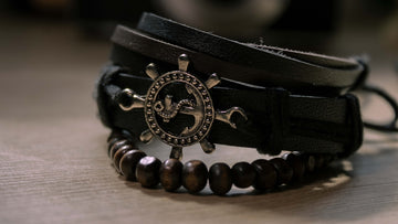 a close up of a bracelet on a table