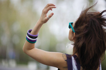 a woman with her arm in the air